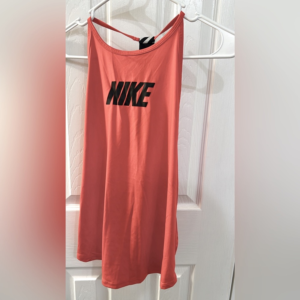 Coral Nike Dri Fit, like new . Size small